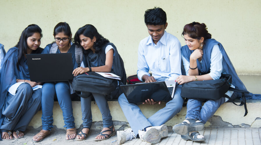 students at laptops