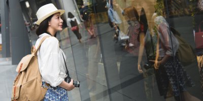 woman window shopping in Hong kong