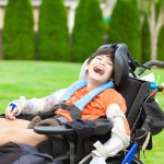 a disabled boy in a wheelchair