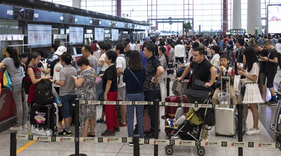 crowds at a beijing airport