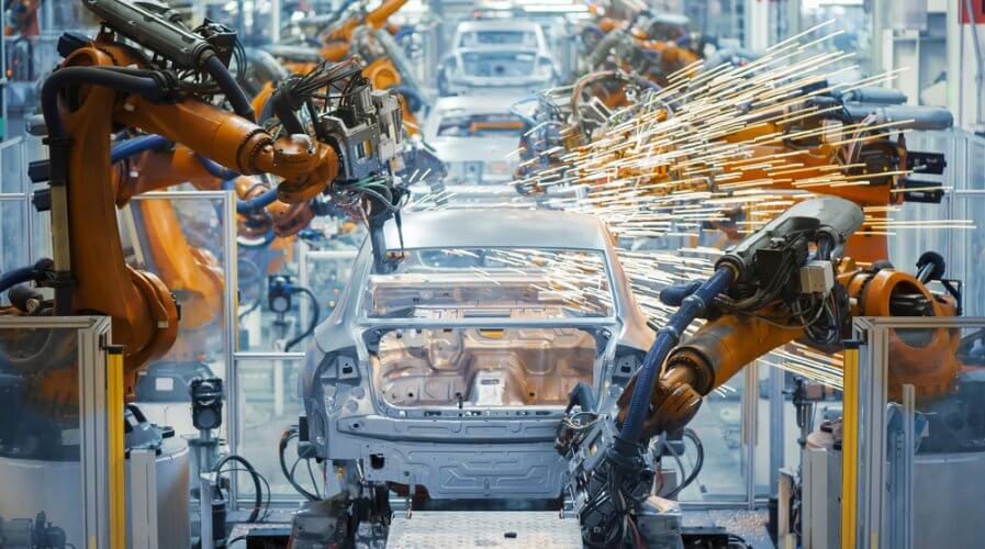 a car manufacturing line using robots and automation
