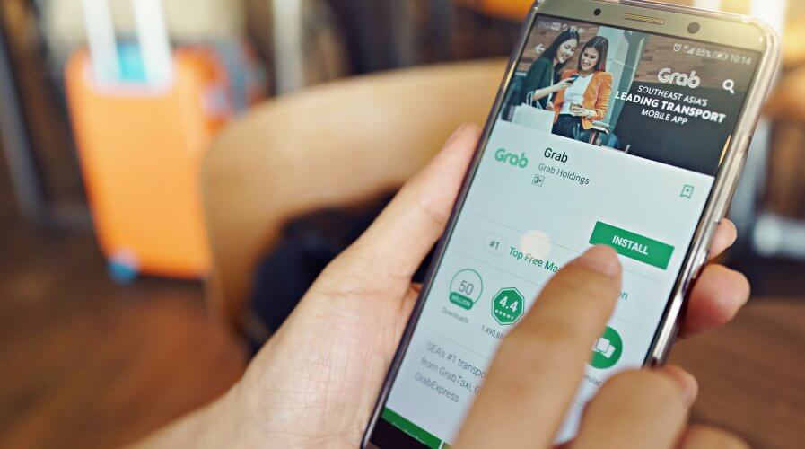 Grab partners with ZhongAn to bring digital insurance to the Southeast Asia market. Source: Shutterstock