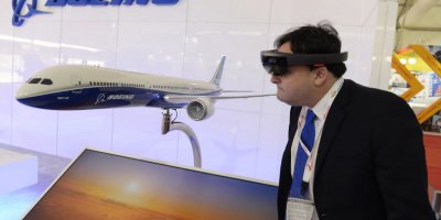 VR can radically transform in-flight entertainment. Source: Noah Seelam / AFP