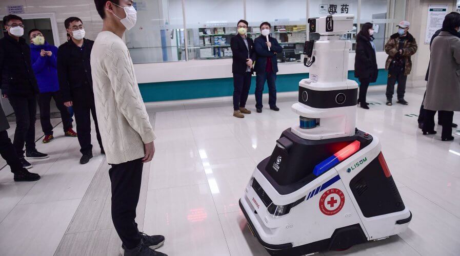 A patrol robot used to check temperatures, identities and disinfect people in Shenyang in China. The hospital uses the robot to reduce the pressure on front-line medical staff.