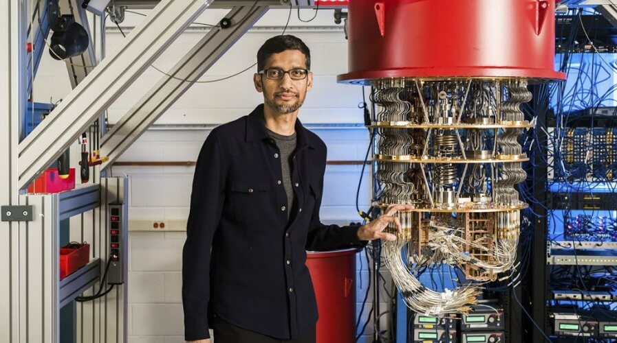 Sundar Pichai, CEO of Alphabet with one of Google's quantum computers.