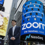 Zoom founder Eric Yuan poses in front of the Nasdaq building after the opening bell ceremony on April 18, 2019