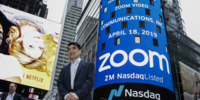 Zoom founder Eric Yuan poses in front of the Nasdaq building after the opening bell ceremony on April 18, 2019
