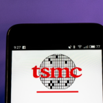 TSMC logo seen displayed on smart phone. Taiwan Semiconductor Manufacturing Company, Limited is world's largest dedicated independent (pure-play) semiconductor foundry