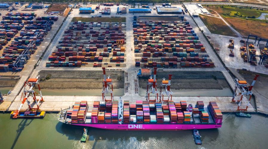 Top view aerial of International container port Tan Cang - Cai Mep. Ba Ria, Vung Tau, Vietnam. Connect to Ho Chi Minh City by Thi Vai river and national road 51