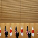US President received Japan's prime minister for his first in-person summit, and was expected to announce a US$2 billion 5G initiative to compete with China