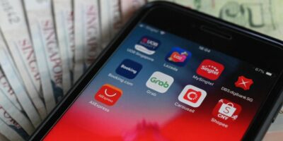 The APAC region has seen a massive jump in downloads of fintech apps, showing strong support for fintech to grow in the region. (Photo by Roslan RAHMAN / AFP)