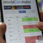 Tiger Brokers skip China for crypto services amidst crackdown by govt. Person looks at crypto trading prices on a mobile app