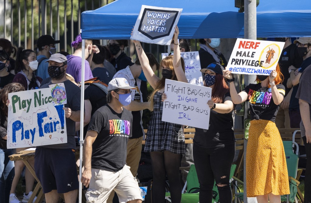 Employees of the video game company, Activision Blizzard, hold a walkout and protest rally to denounce the company's response to a California Department of Fair Employment and Housing lawsuit and to call for changes in conditions for women and other marginalized groups, in , in Irvine, California, on July 28, 2021.  (Photo by DAVID MCNEW / AFP)