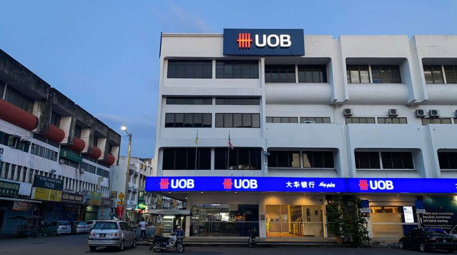 NOV 14, 2020: A United Overseas Bank store front in the island of Penang, Malaysia. (IMG/mokjc / Shutterstock)