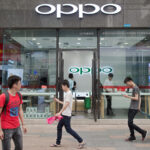 Oppo joins the semiconductor race in China with its own in-house built chipset. (Photo by Nicolas ASFOURI / AFP)