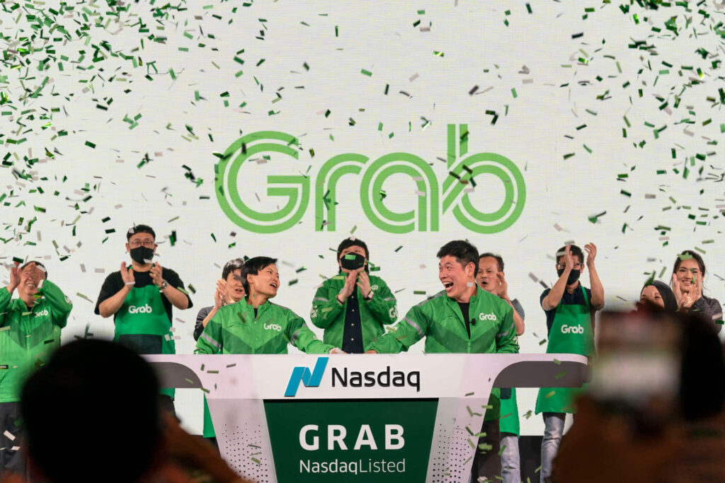 Anthony Tan and Tan Hooi Ling, co-founders of Grab, were joined onstage in Singapore during the opening bell ceremony at Nasdaq.