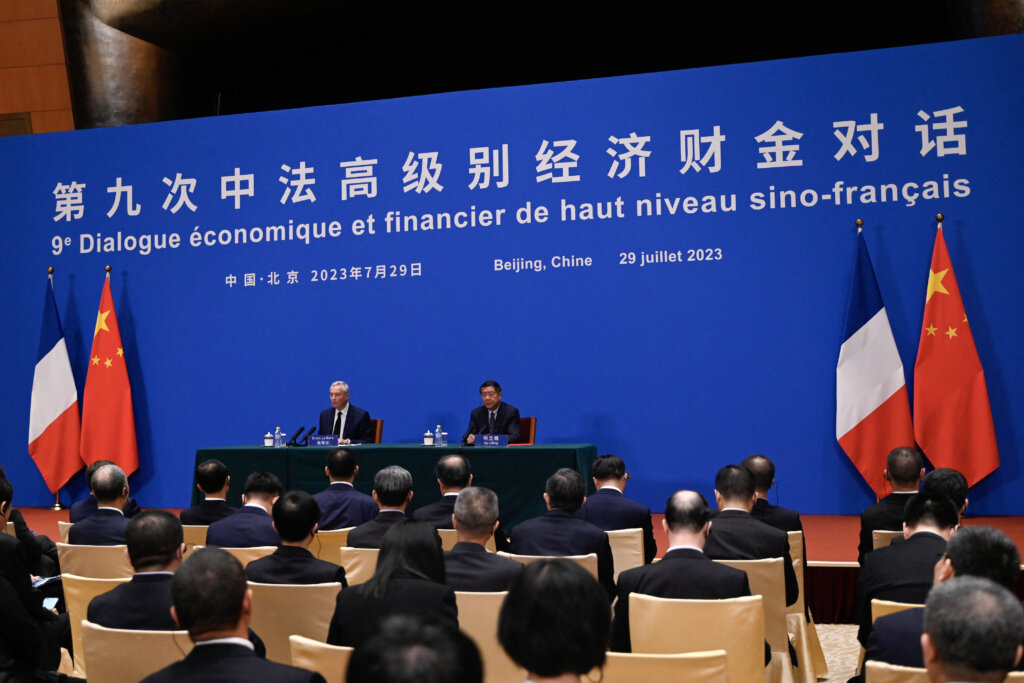 Chinese Vice Premier He Lifeng (R) with French Minister of Economy and Finances Bruno Le Maire attend the 9th China-France High Level Economic and Financial Dialogue at the Diaoyutai State Guest House in Beijing on July 29, 2023. (Photo by Pedro PARDO / AFP)