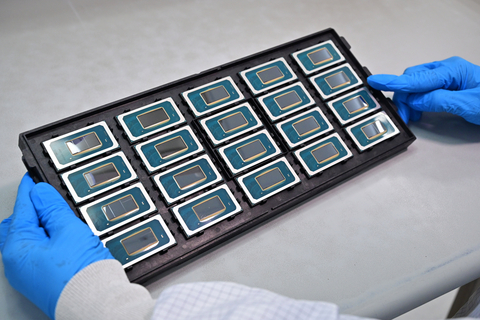 AI PC. A photo shows a tray of Intel Core Ultra processors being assembled at Intel’s advanced packaging facilities in Penang, Malaysia. The Intel Core Ultra processor, code-named Meteor Lake, is the first client processor manufactured on the new Intel 4 process node using its 3D high-performance hybrid architecture, and the first client tile-based design enabled by Foveros packaging technology and features CPU, GPU and NPU. (Credit: Intel Corporation)