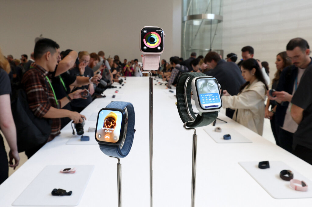 Brand new Apple Watches are displayed during an Apple event.