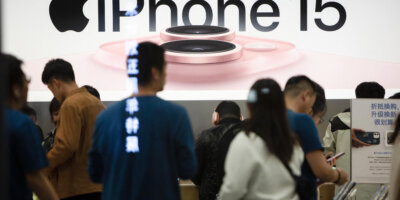 This photo taken on October 30, 2023 shows a poster for the new iPhone 15 at an Apple store in Shenyang, in China's northeastern Liaoning province. (Photo by AFP) / China OUT