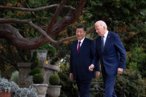US President Joe Biden (R) and Chinese President Xi Jinping walk together after a meeting during the Asia-Pacific Economic Cooperation (APEC) Leaders' week in Woodside, California on November 15, 2023. (Photo by Brendan Smialowski / AFP)
