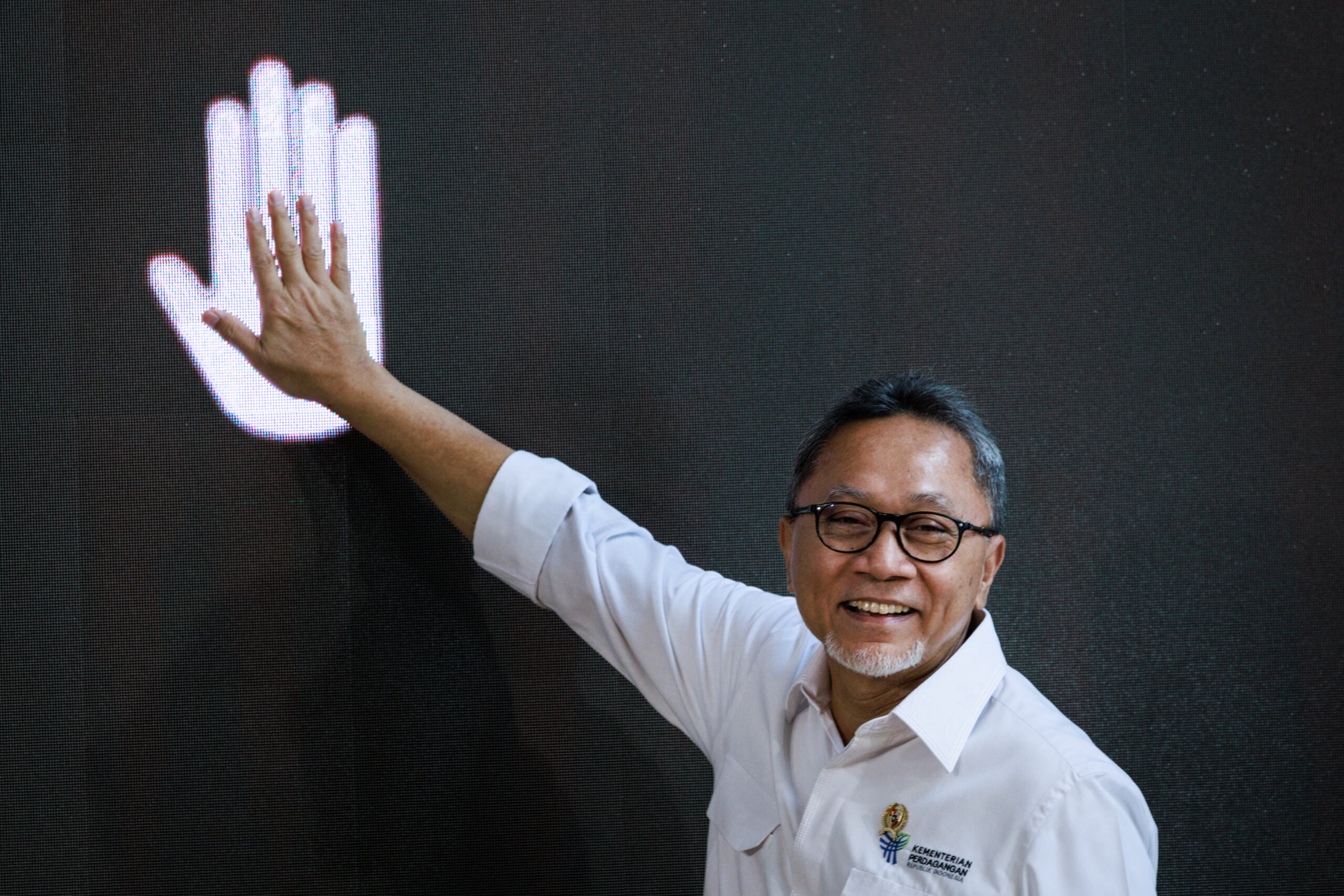 Indonesia's Trade Minister Zulkifli Hasan poses during the launch of social media video sharing app TikTok and Indonesia's leading e-commerce site Tokopedia's Buy Local Campaign in Jakarta on December 12, 2023. (Photo by Yasuyoshi CHIBA / AFP).