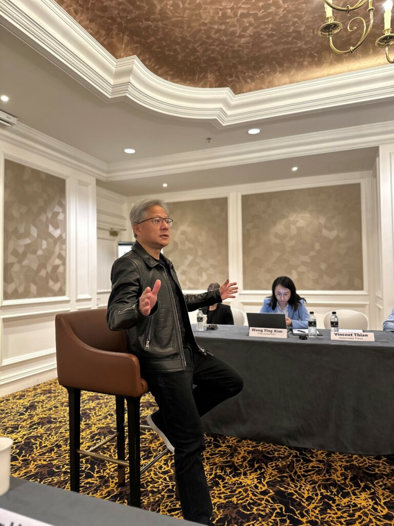 Clad in his signature look – a black leather jacket, often paired with a black T-shirt and black jeans, which he wears every time he is in the public eye – Huang spent an hour with local reporters during his maiden trip to Malaysia. Photo: Tech Wire Asia
