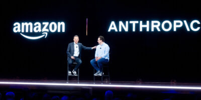 Amazon Web Services (AWS) CEO Adam Selipsky speaks with Anthropic CEO and co-founder Dario Amodei during AWS re:Invent 2023. (Image from AFP).